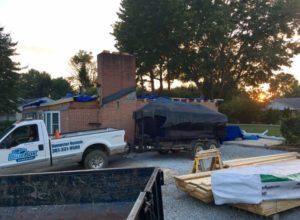 Blue Box Rental Dumpster on job site