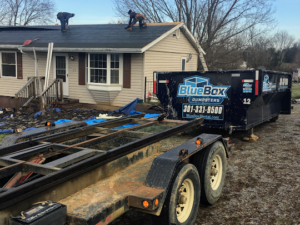 BlueBox Rental dumpster at roof replacement job site