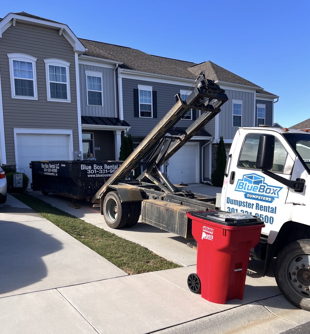 Rental dumpster delivered to a home's driveway